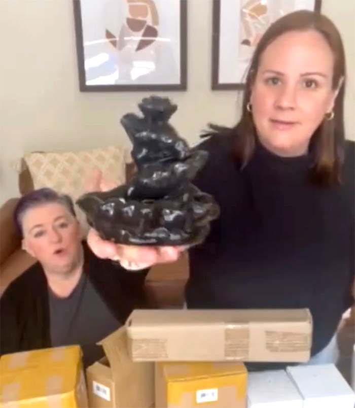 Kim and Sam unboxing products for the Mystic Avenue Store